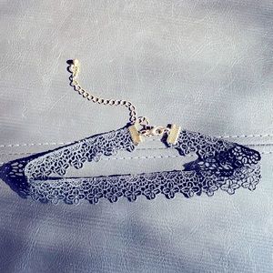 Black lace choker, gold metal clasp